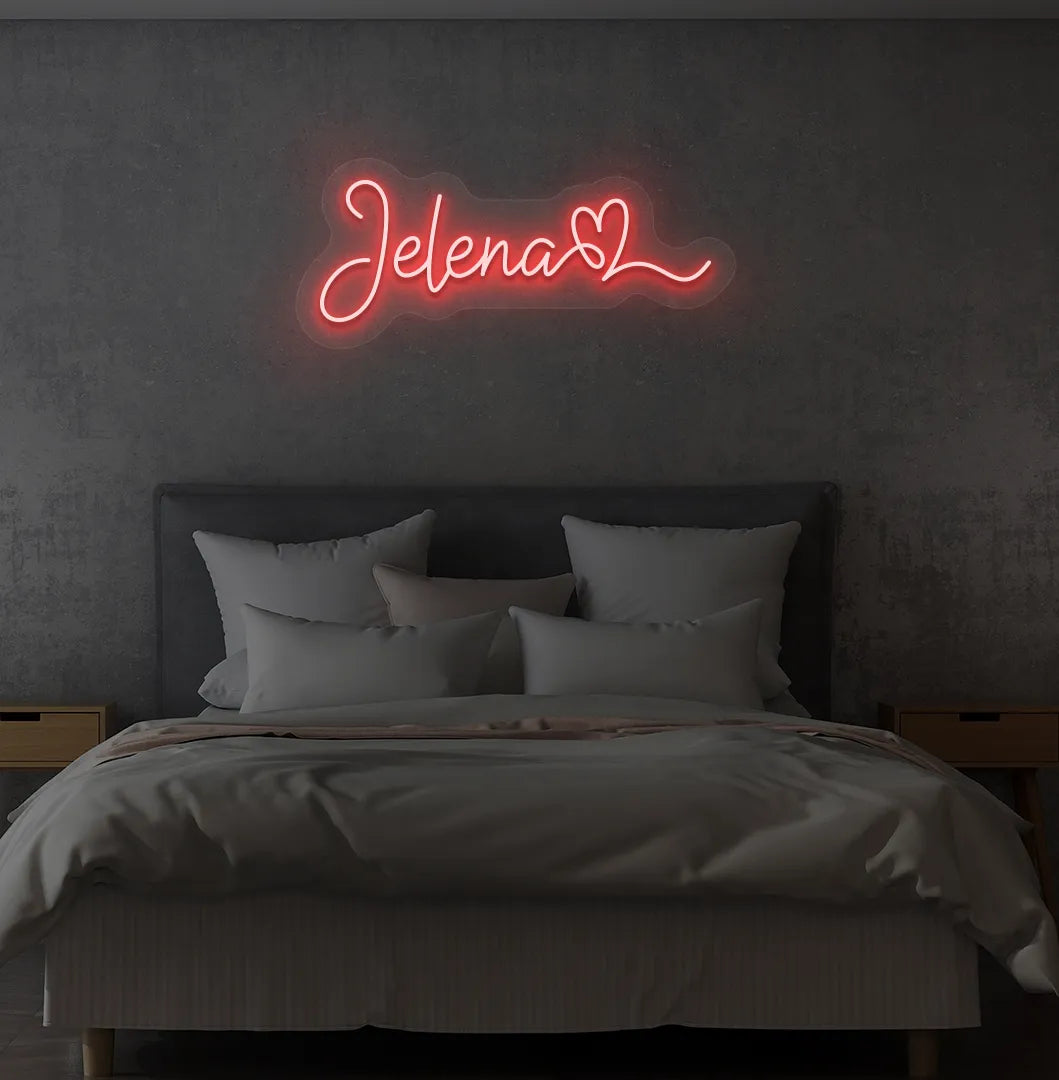 Personalized Name with Heart neon sign in red color mounted on modern wall.