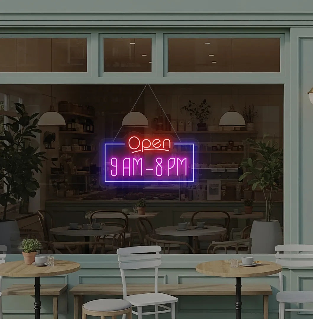 Personalized Open Hours neon sign in pink color mounted on glass window.