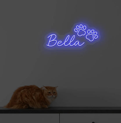 Personalized Pet Name neon sign in blue color mounted on modern wall.