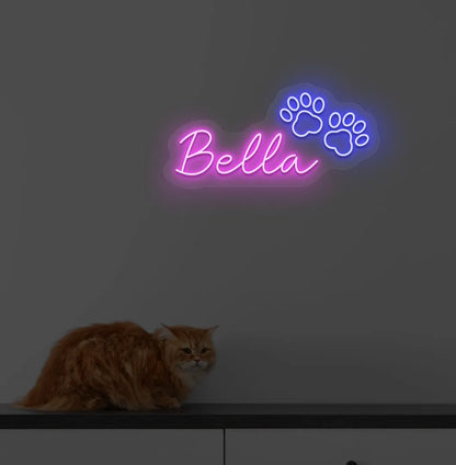 Personalized Pet Name neon sign in pink color mounted on modern wall.