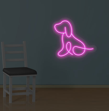 Image of a bright dog LED neon sign mounted on wall in pink color.