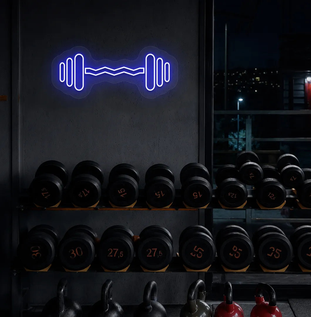 Image of an aesthetic gym wall with dumbbell neon sign glowing blue.