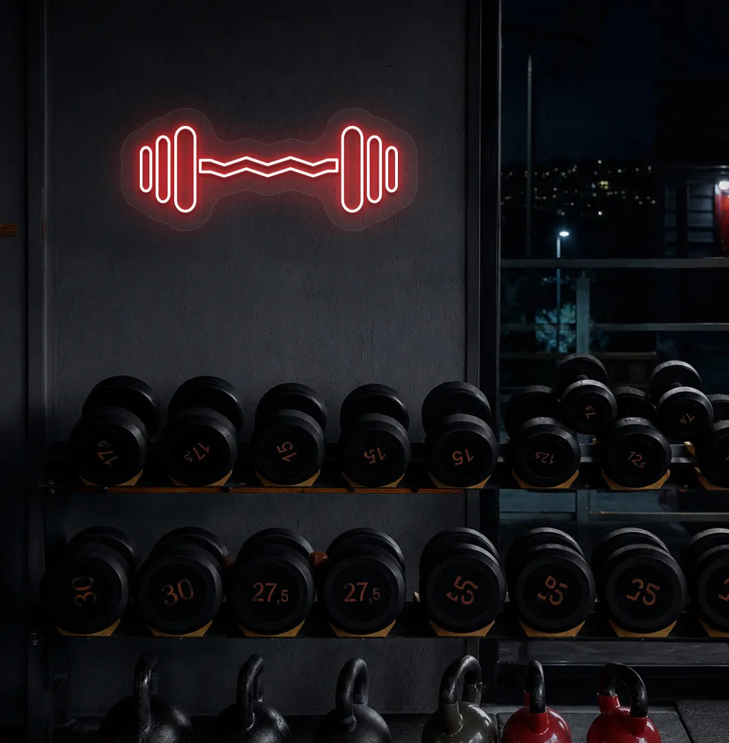Image of an aesthetic gym wall with dumbbell neon sign glowing red.