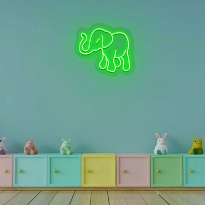 Image of a cute elephant neon sign in green color for a kids' bedroom wall.