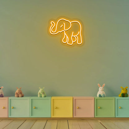 An elephant orange LED neon sign glowing on kids' room wall decor.