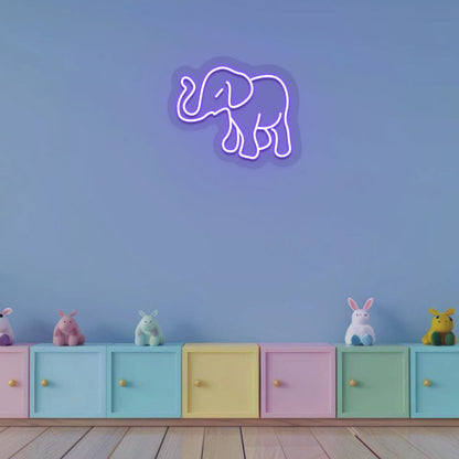 Nursery wall with elephant neon sign in purple LED. Perfect for kids’ rooms, playrooms, activity areas, night ambiance lighting, and gifts for children.