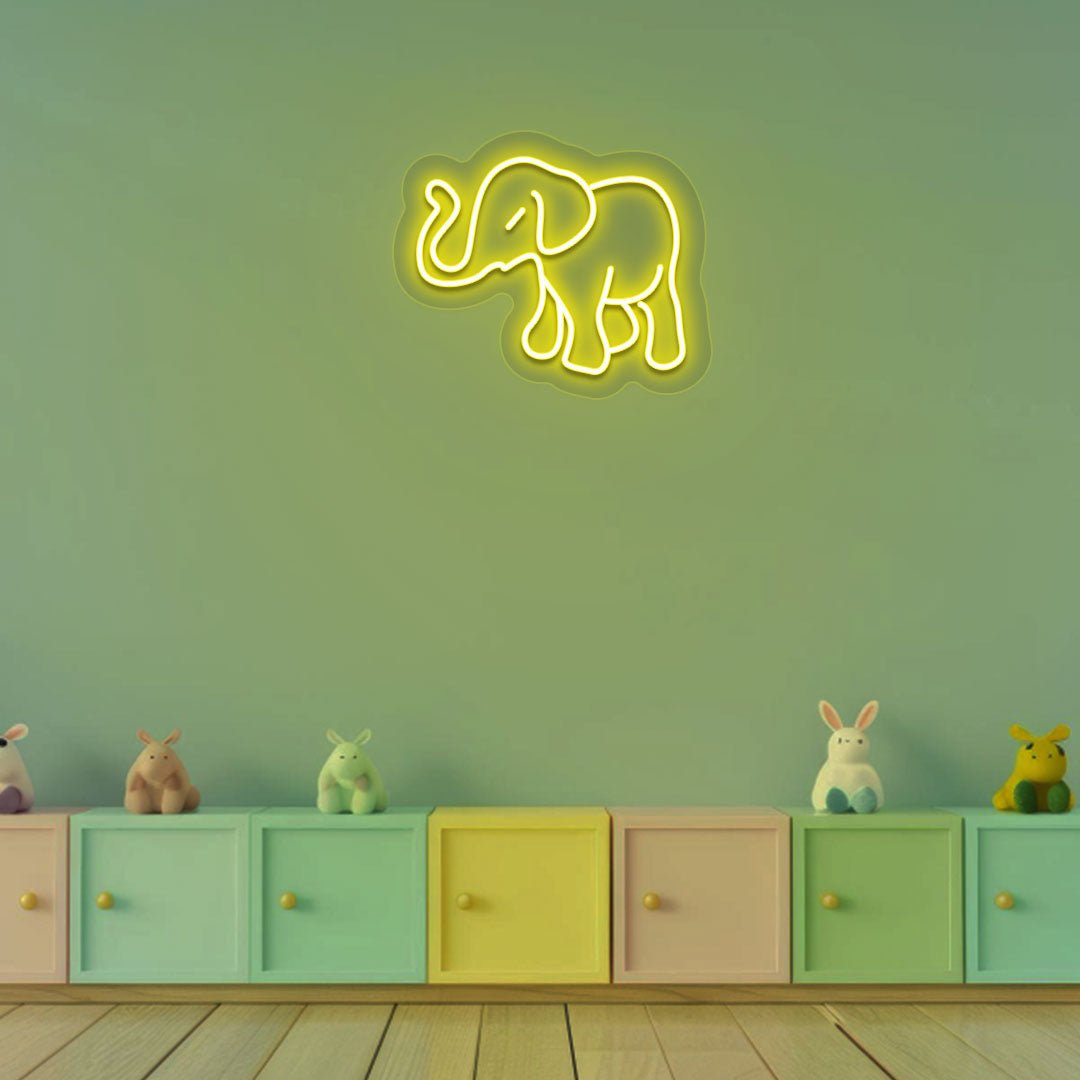 Nursery wall with elephant neon sign in yellow LED. Perfect for kids’ rooms, playrooms, activity areas, night ambiance lighting, and gifts for children.