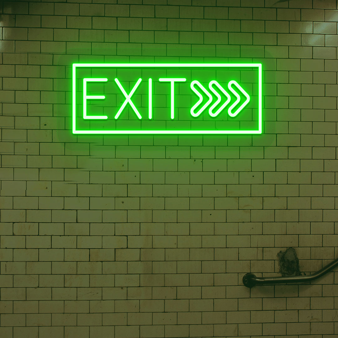 Image of an exit LED neon sign glowing on a brick-patterned wall in green.
