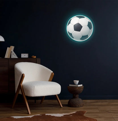 Image of a bright ice blue FIFA football neon sign mounted on aesthetic room wall.