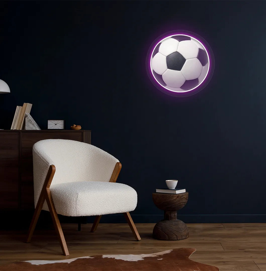 Image of a bright pink FIFA football neon sign mounted on aesthetic room wall.
