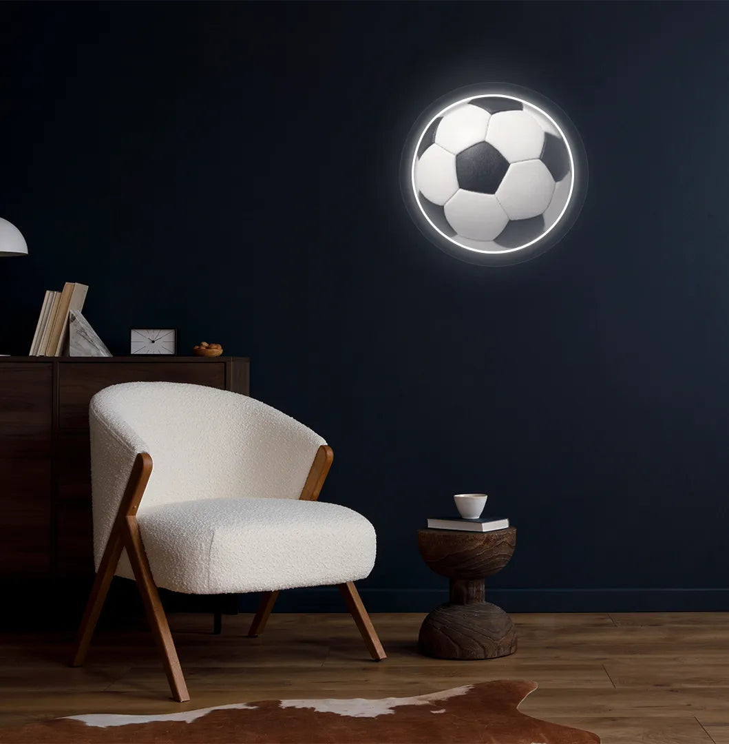 Image of a bright white FIFA football neon sign mounted on aesthetic room wall.
