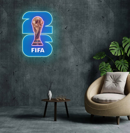 Stylish "FIFA World Cup Trophy 2026" neon sign mounted on aesthetic wall in pink color.