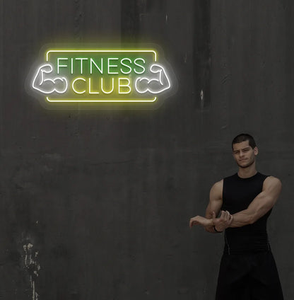 Stylish fitness club neon sign in green mounted on gym wall.