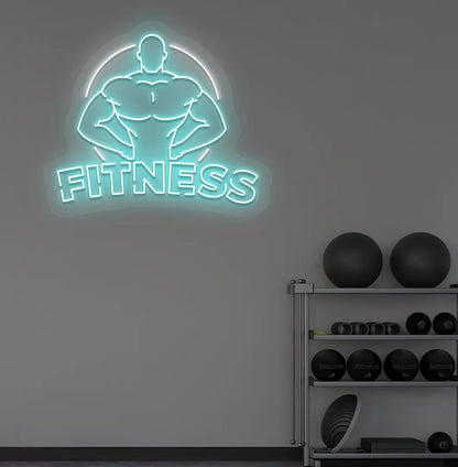 Image of an aesthetic gym wall with fitness neon sign glowing ice blue.