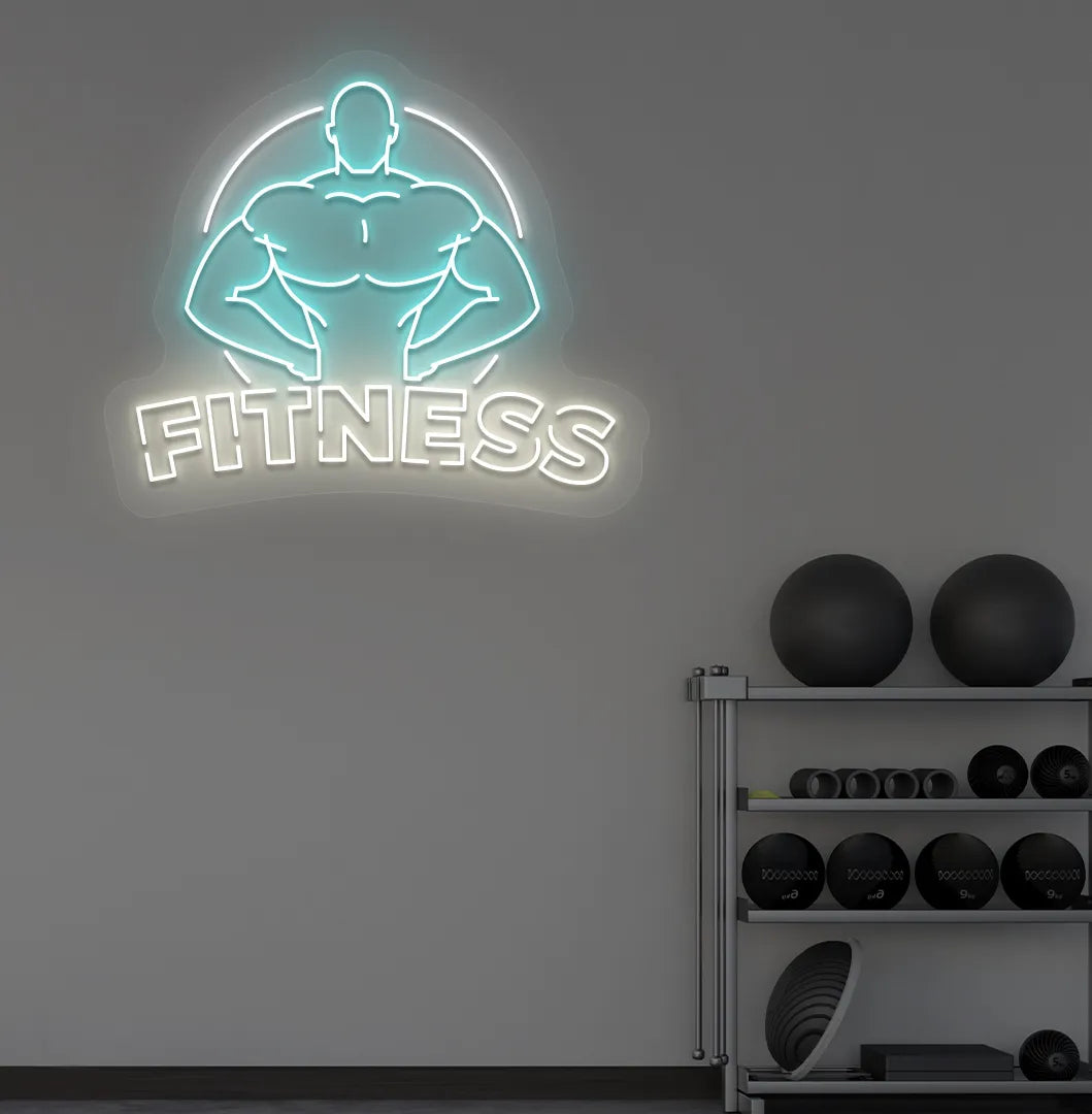 Trendy fitness neon sign in white mounted on fitness wall.