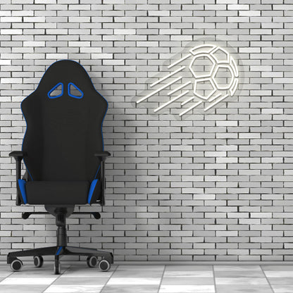 A sports warm white LED flying football neon sign glows on a brick wall with a chair. Perfect for game rooms, sports setups, and streamers.