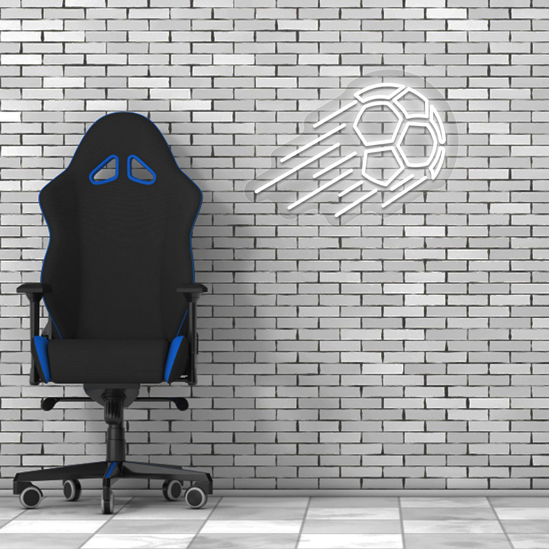 Image of a flying football neon sign in white LED on a brick design wall with a chair setup.