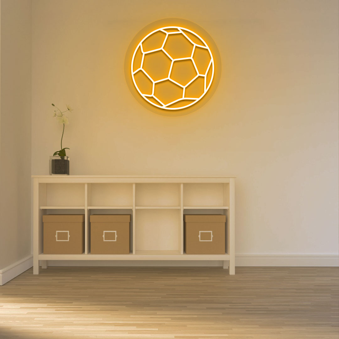 A bright orange football neon sign is glowing on the wall. perfect for game rooms, sports areas, living rooms, and sports cafés.