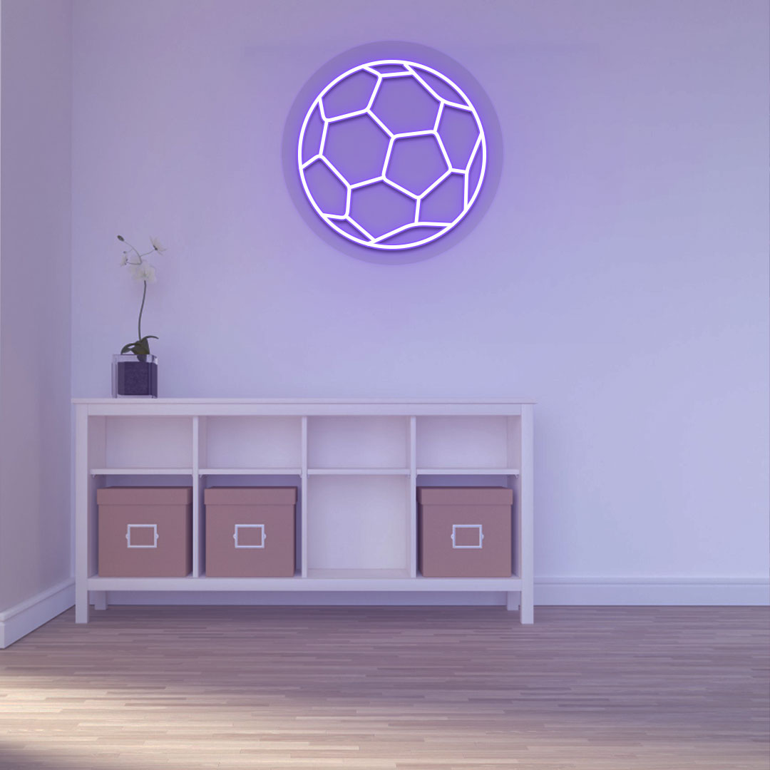 A stylish purple LED football neon sign is glowing on a wall. 