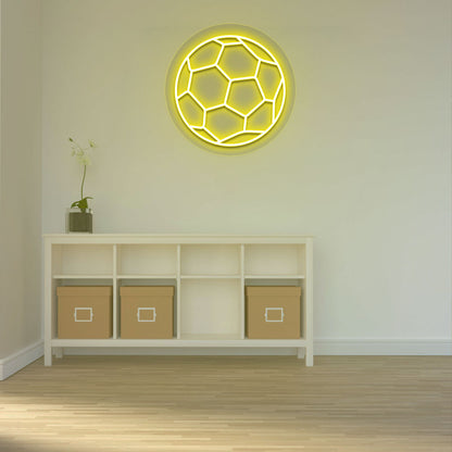 A bright yellow football neon sign is glowing on the wall. perfect for game rooms, sports areas, living rooms, and sports cafés.