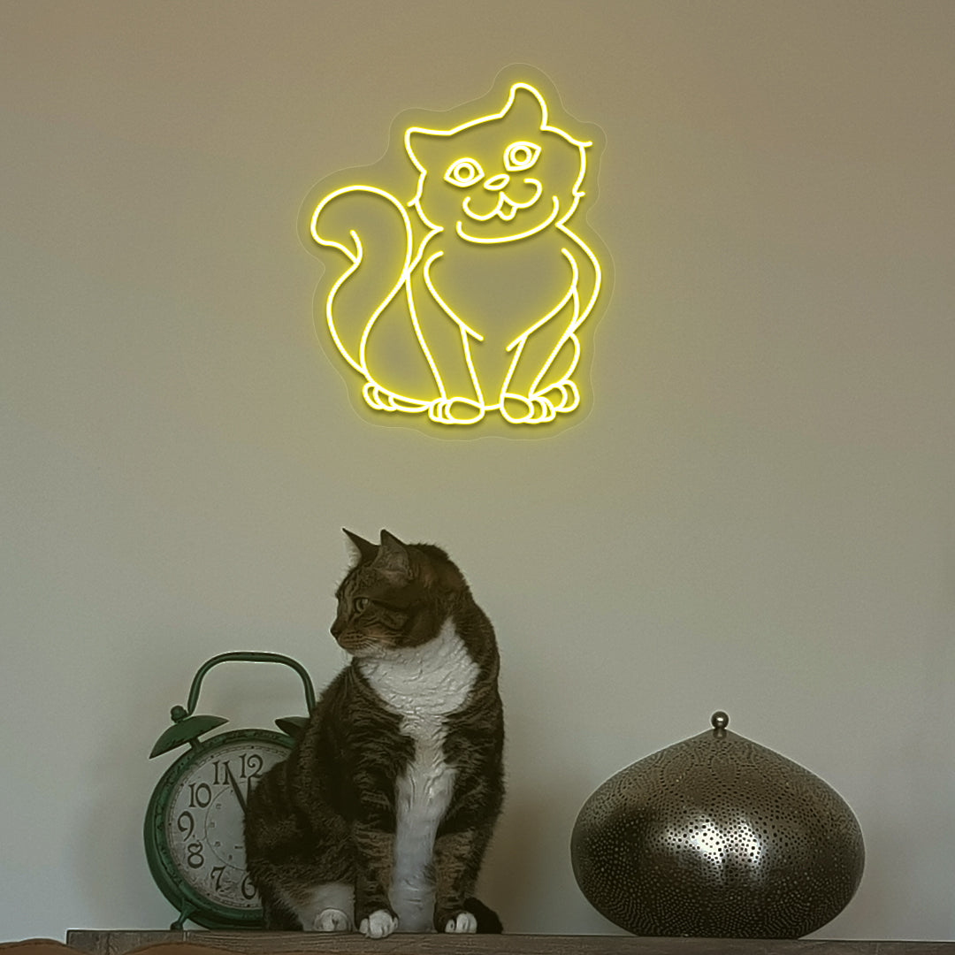 A stylish yellow cat LED neon sign above a cute cat is mounted on the wall. Perfect for pet lovers, bedroom, living room décor, and kids’ rooms.