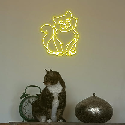 A stylish yellow cat LED neon sign above a cute cat is mounted on the wall. Perfect for pet lovers, bedroom, living room décor, and kids’ rooms.