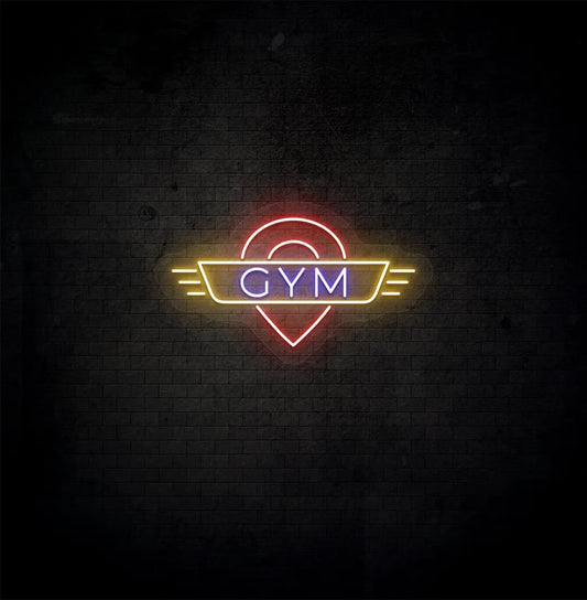 Image of an aesthetic gym wall with GYM neon sign glowing blue.