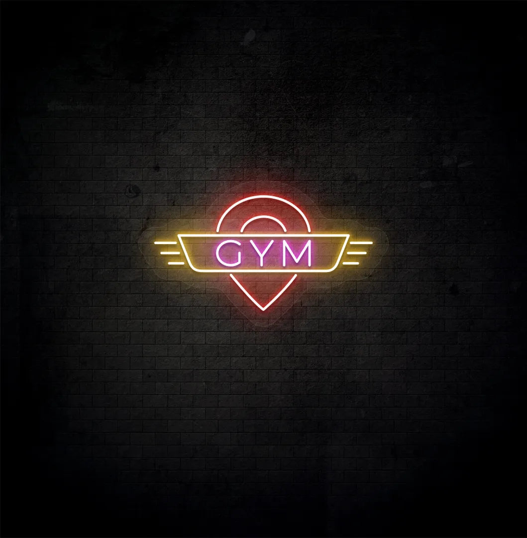 Image of an aesthetic gym wall with GYM neon sign glowing pink.