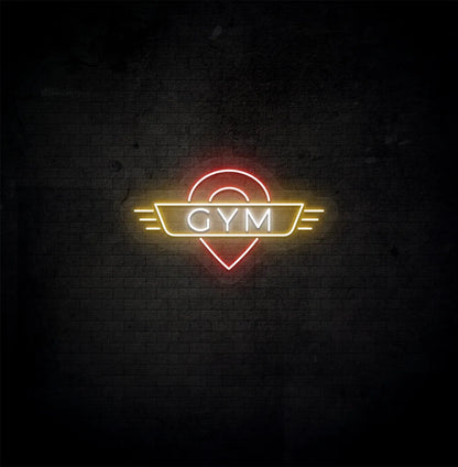 Image of an aesthetic gym wall with GYM neon sign glowing white.