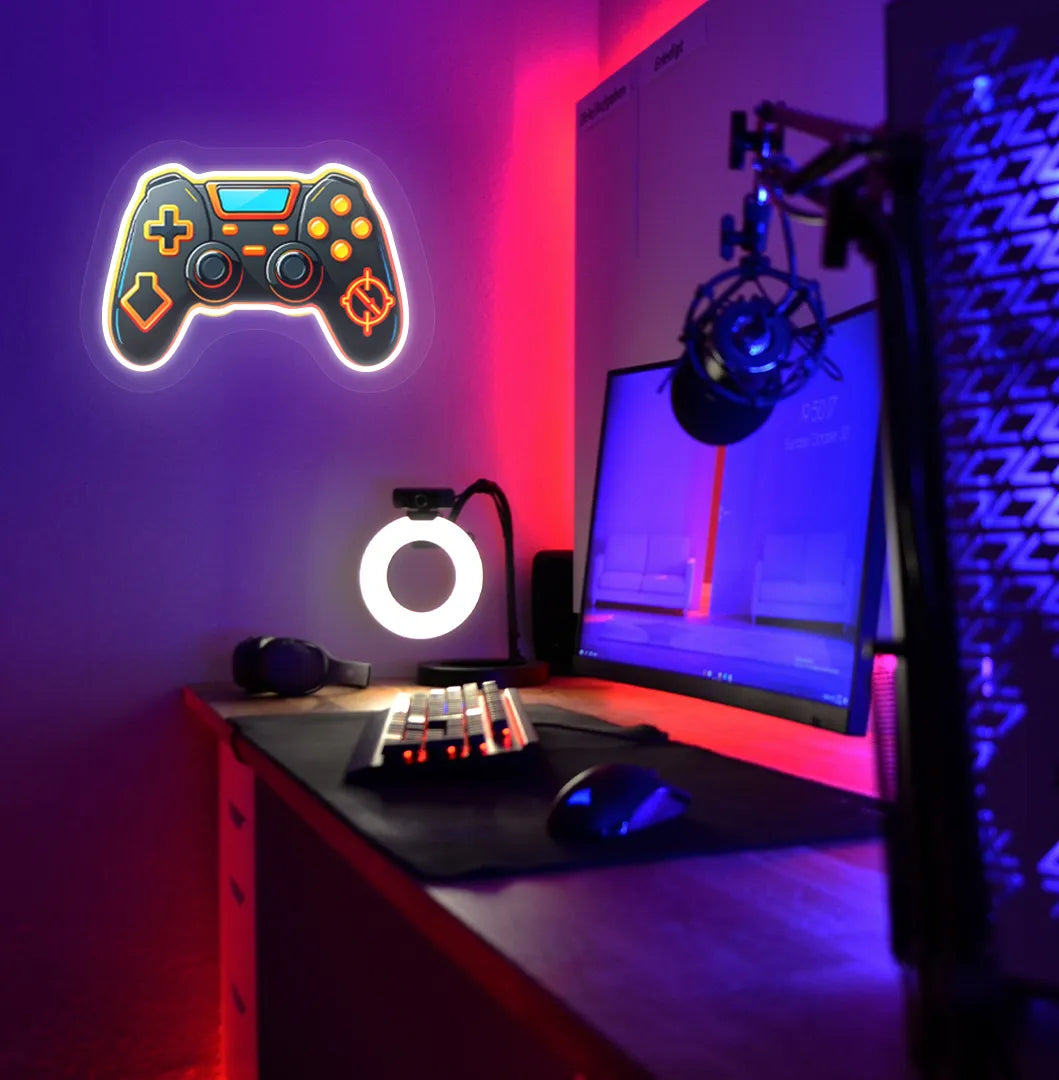 Image of a "Game controller" neon sign in white color mounted on gaming room wall.