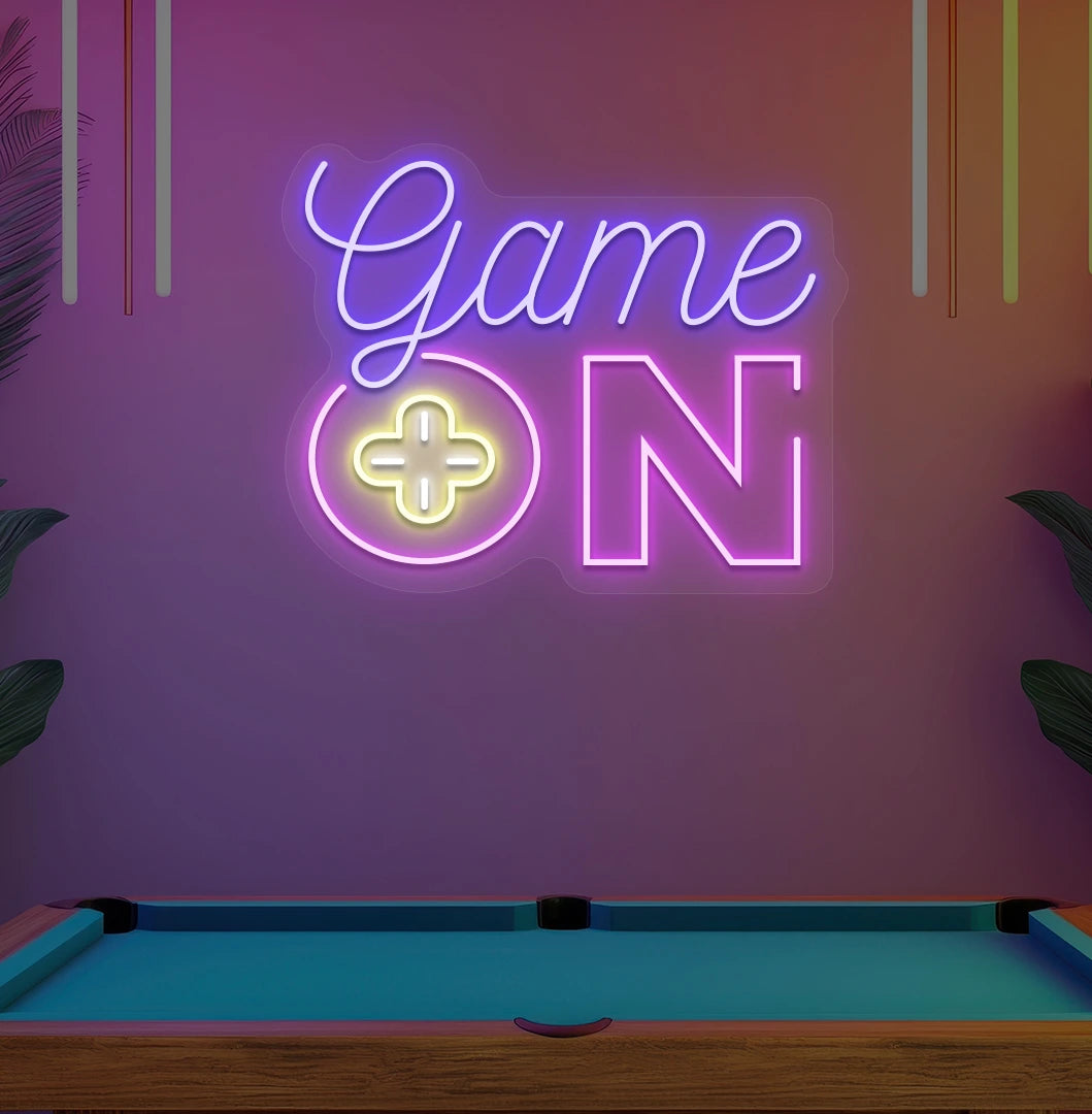 Image of a "game on" LED neon sign glowing on an aesthetic wall in blue.