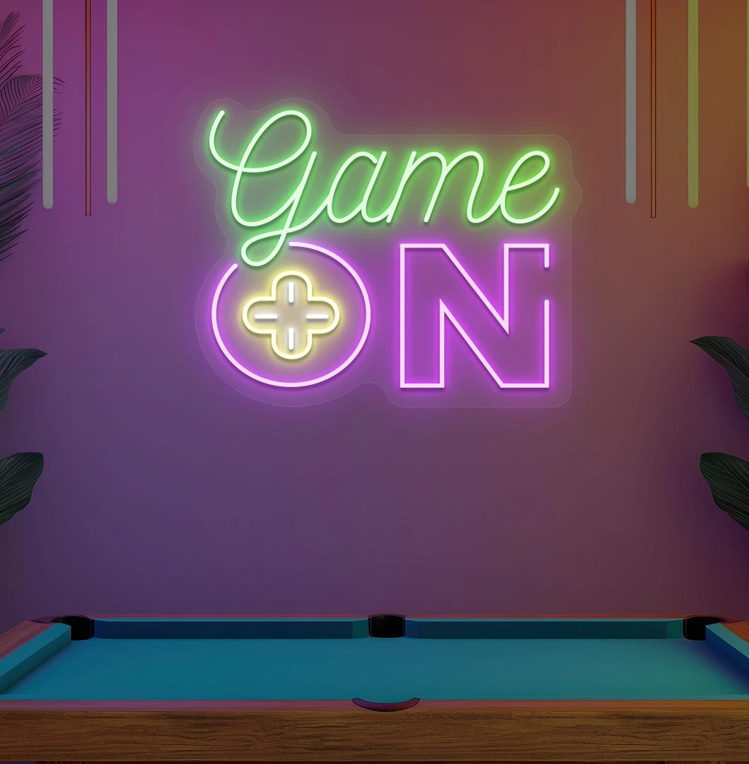 Game On neon sign glowing green on aesthetic wall in home entertainment area.