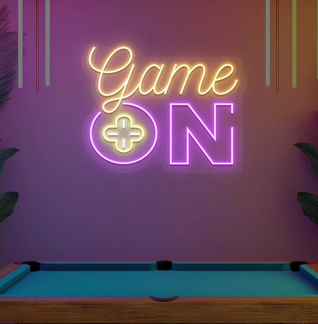 Game On neon sign glowing orange on aesthetic wall in home entertainment area