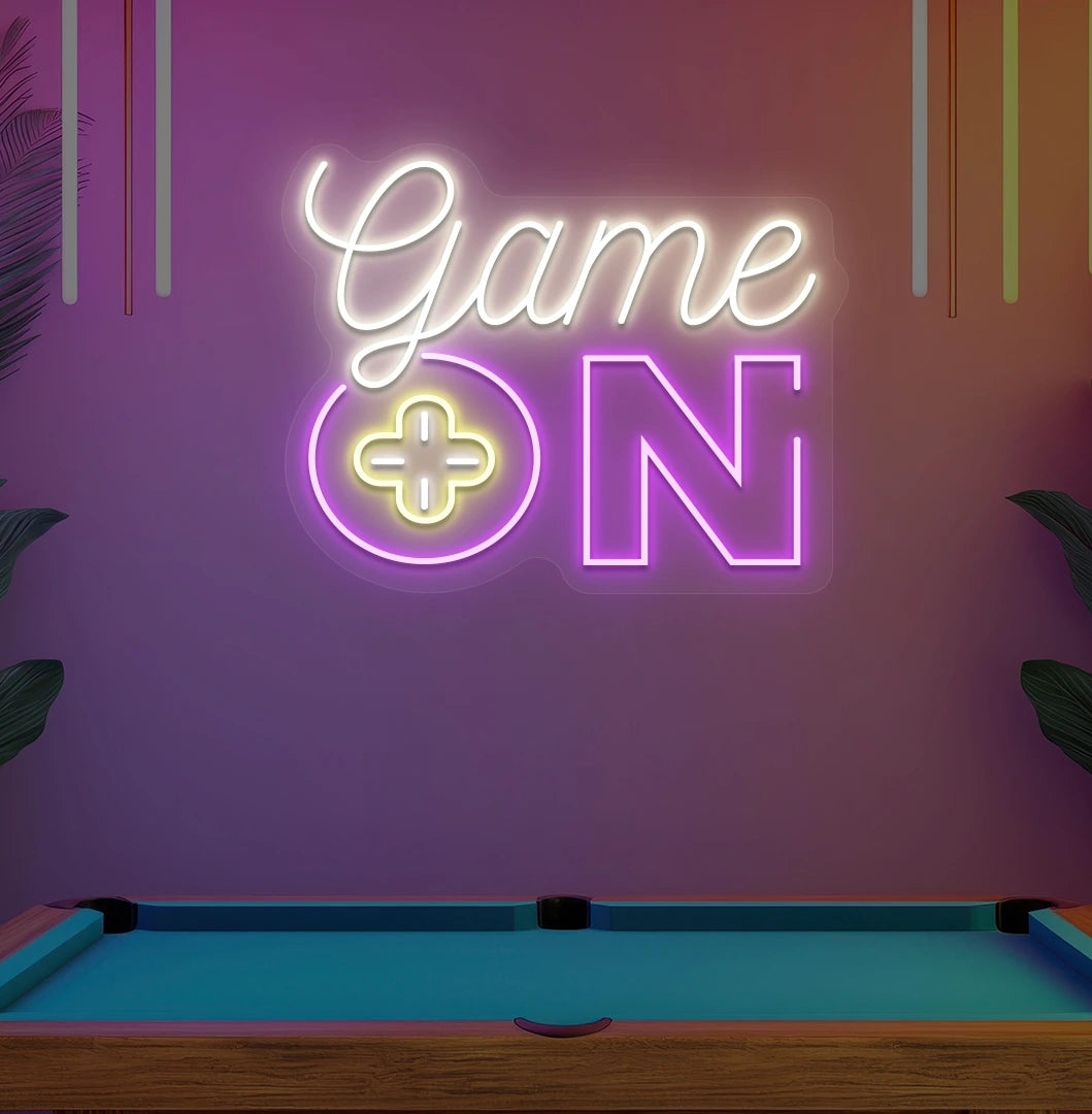 Game On neon sign glowing warm white on aesthetic wall in home entertainment area