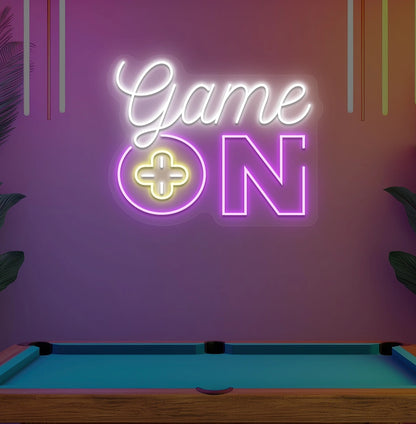 Image of a "game on" LED neon sign glowing on an aesthetic wall in white.