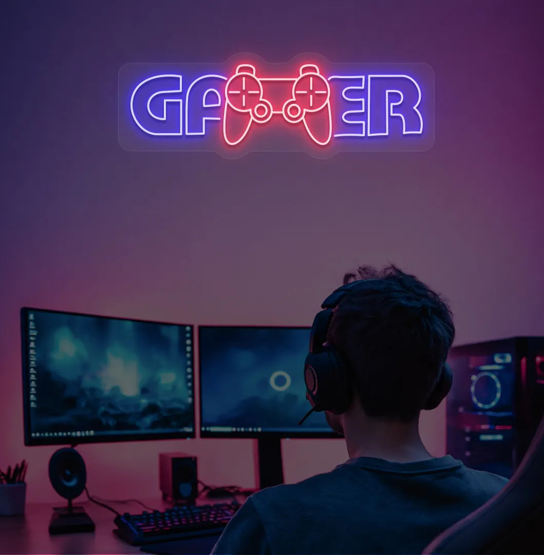 Image of a gamer neon sign mounted on gaming room wall in blue color.