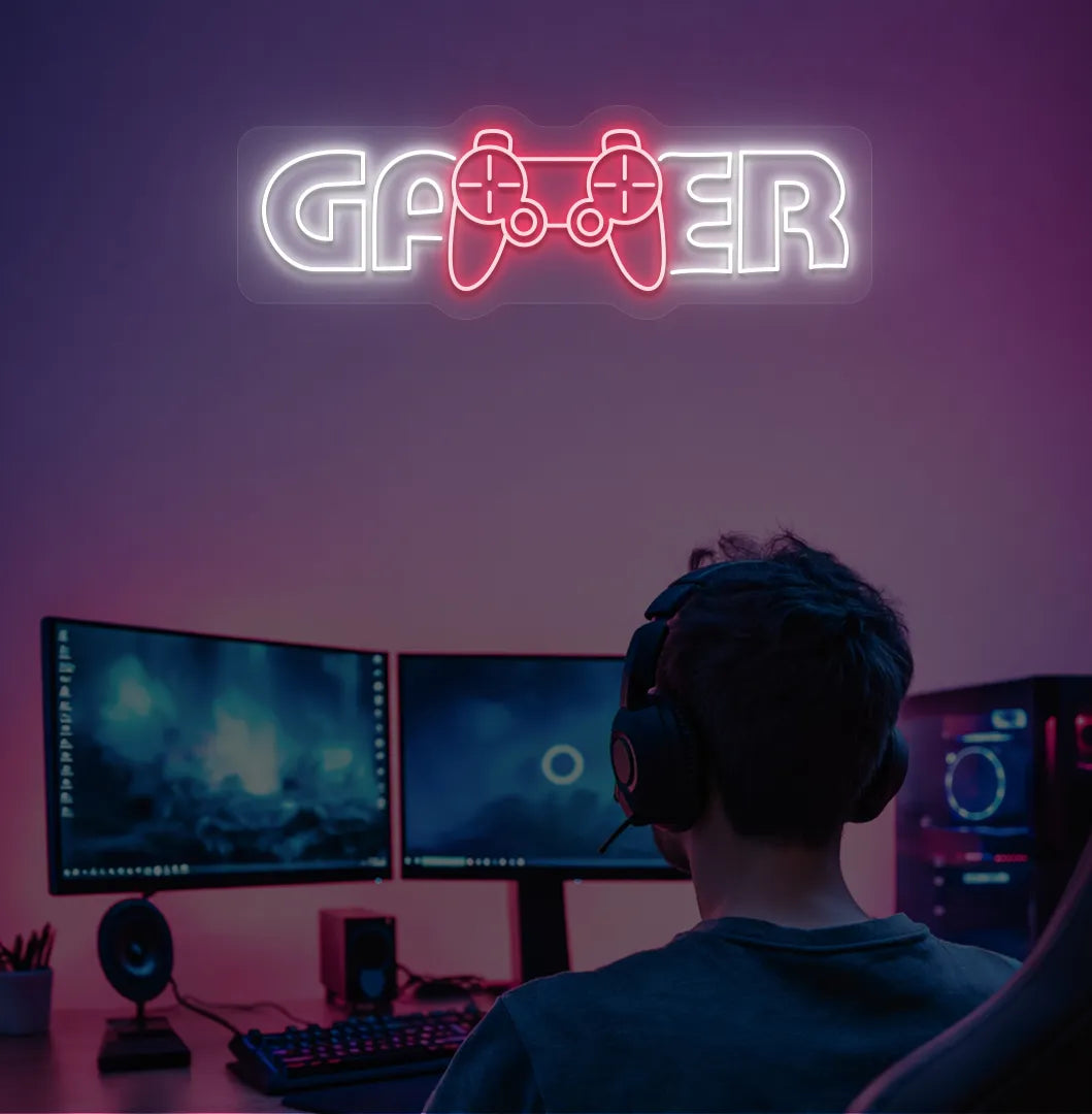 Image of a gamer neon sign mounted on gaming room wall in white color.