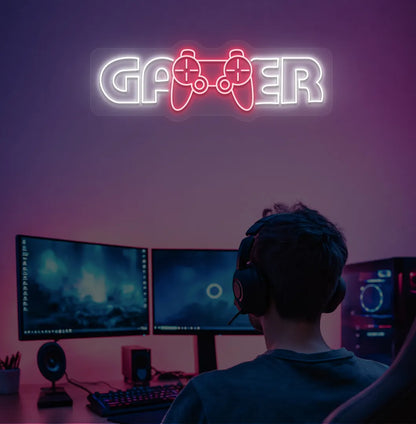 Image of a gamer neon sign mounted on gaming room wall in white color.
