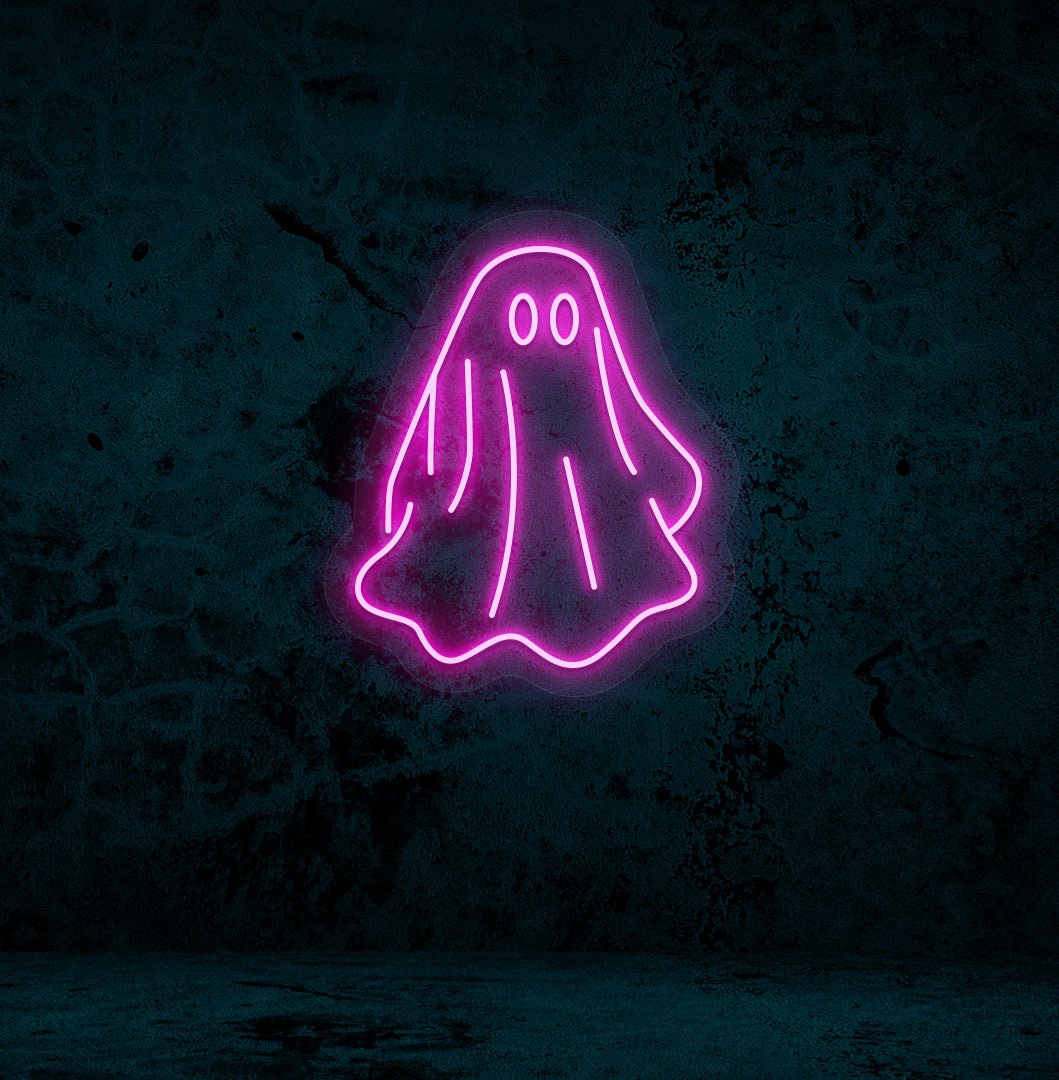 Image of a ghost LED neon sign mounted on a wall in pink color.