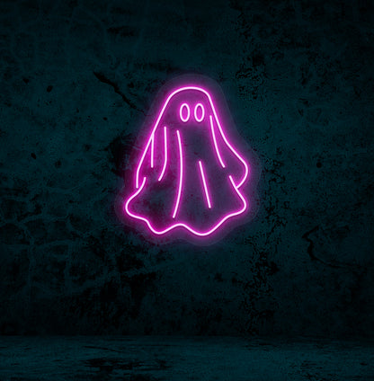 Image of a ghost LED neon sign mounted on a wall in pink color.