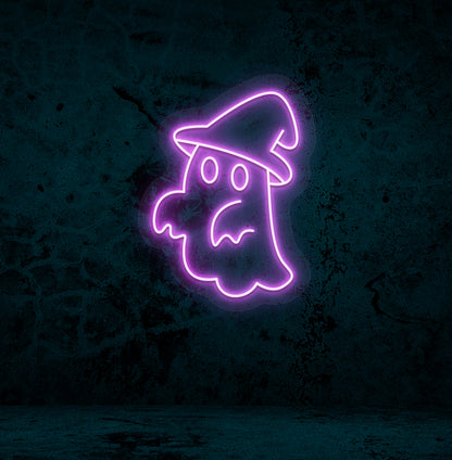 Halloween wall with "ghost with hat" neon sign glowing purple.