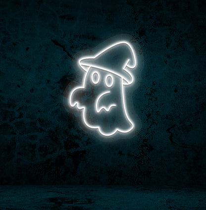 Image of a ghost with hat neon sign glowing on a wall in white color.