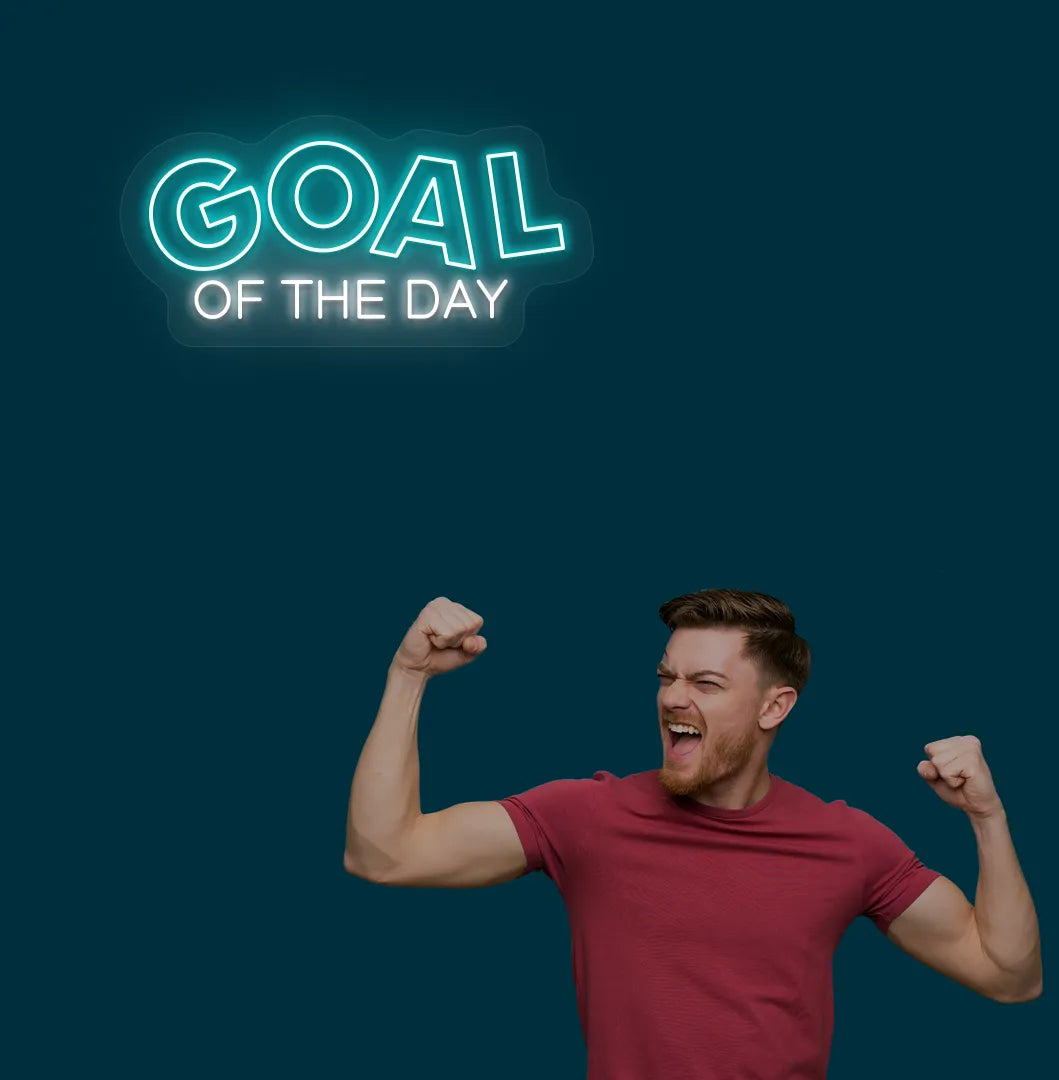 Image of a modern sports wall decor with goal of the day neon sign glowing ice blue.