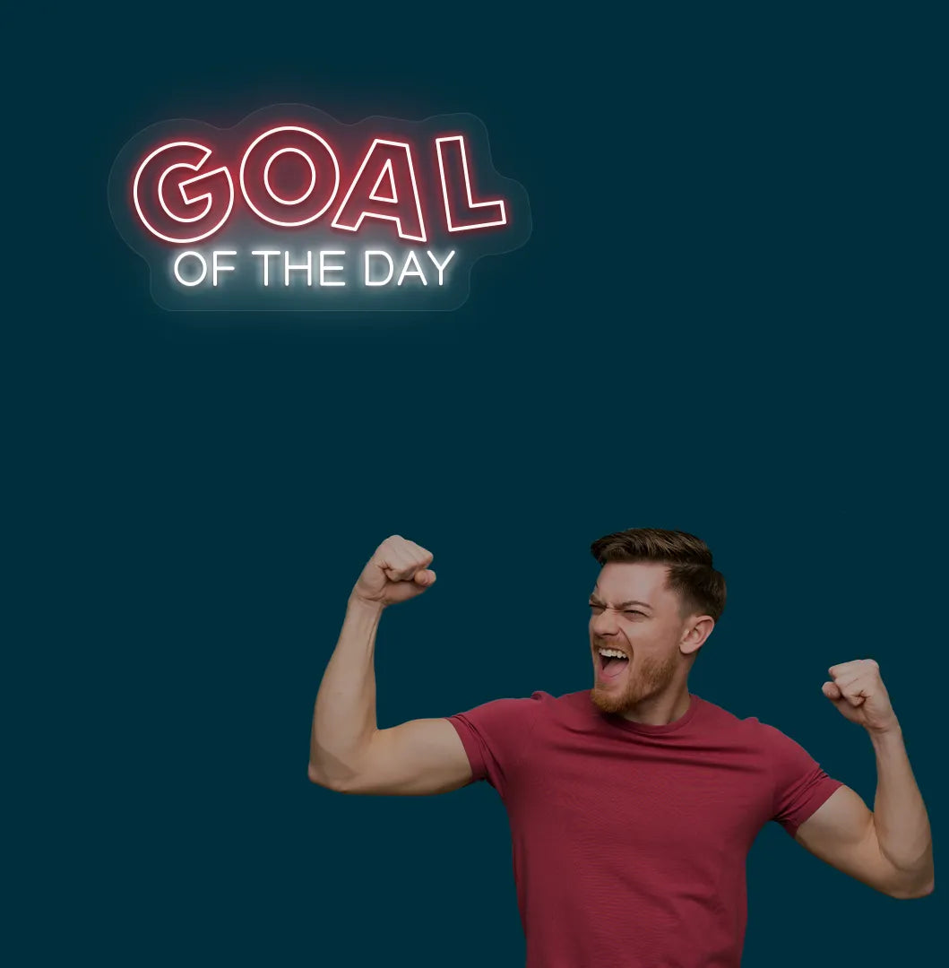 Image of a modern sports wall decor with goal of the day neon sign glowing red.