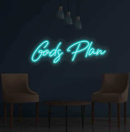 Image of an inspirational "God's Plan" LED neon sign glowing on a wall in ice blue color.