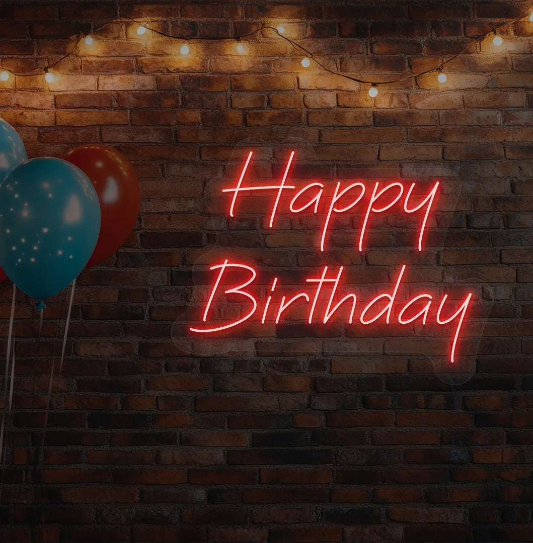 Stylish Happy Birthday neon sign mounted on modern aesthetic wall in red color.