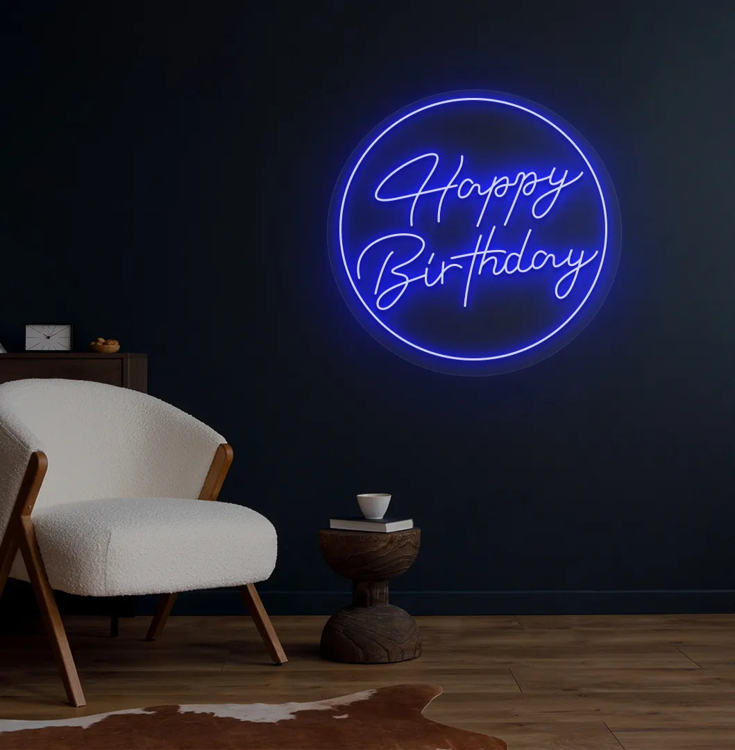 Happy Birthday in circle LED neon sign glowing blue for celebration backdrop.