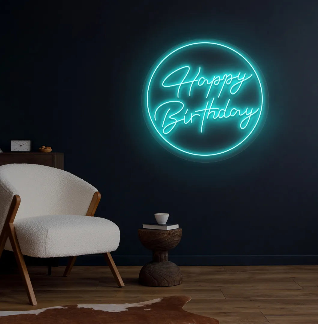 Happy Birthday in circle LED neon sign glowing ice blue for celebration backdrop.