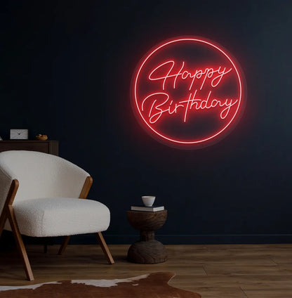 Happy Birthday in circle LED neon sign glowing red for celebration backdrop.