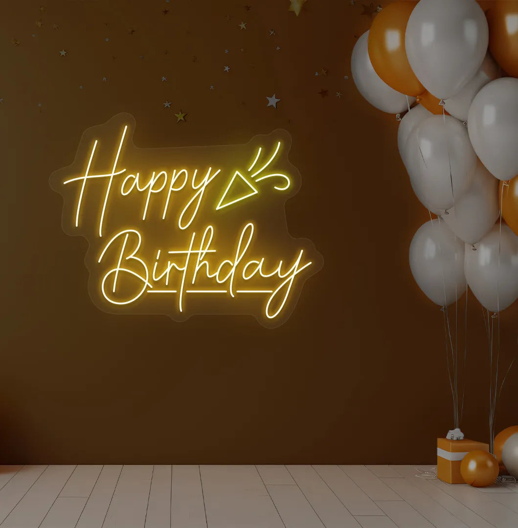 Happy Birthday party popper LED neon sign glowing orange for celebration backdrop.